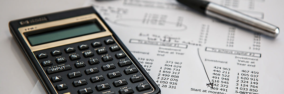 A calculator and paperwork